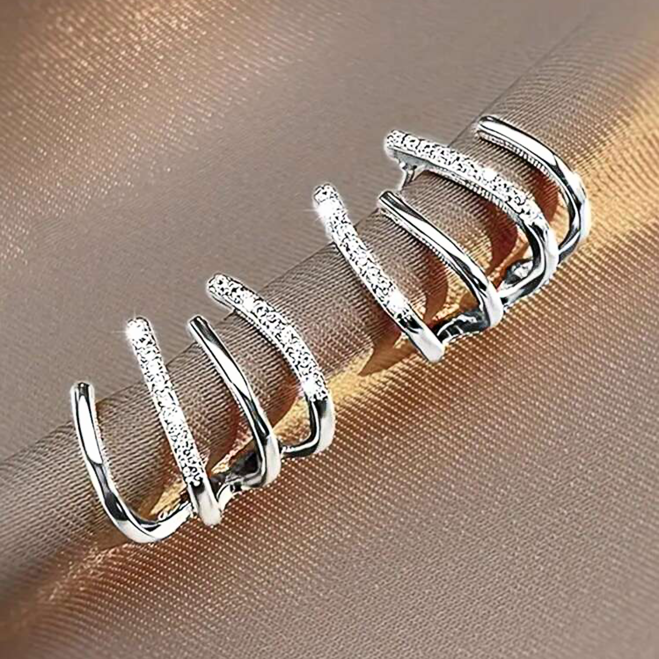 Multi-hole effect claw earrings